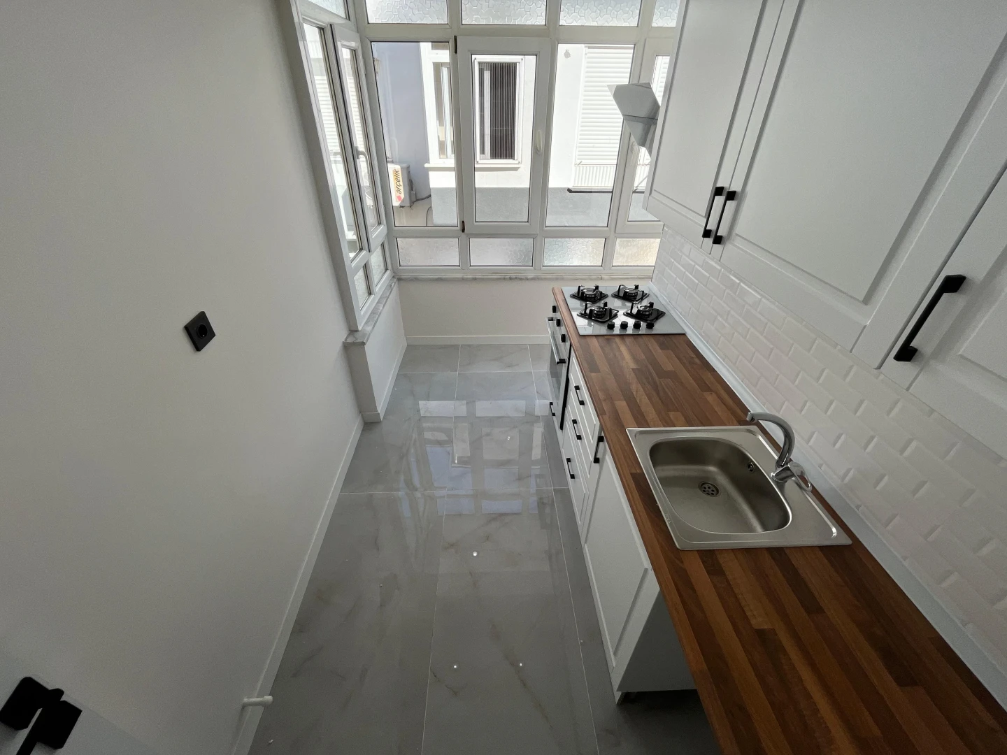 YÜKSELDEN AKÇAY MERKEZDE ÖN CEPHE AYRI MUTFAK 2+1 FIRSAT DAİRE
